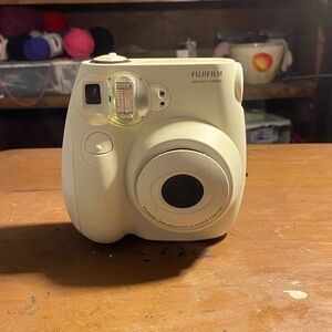 Polaroid camera with film